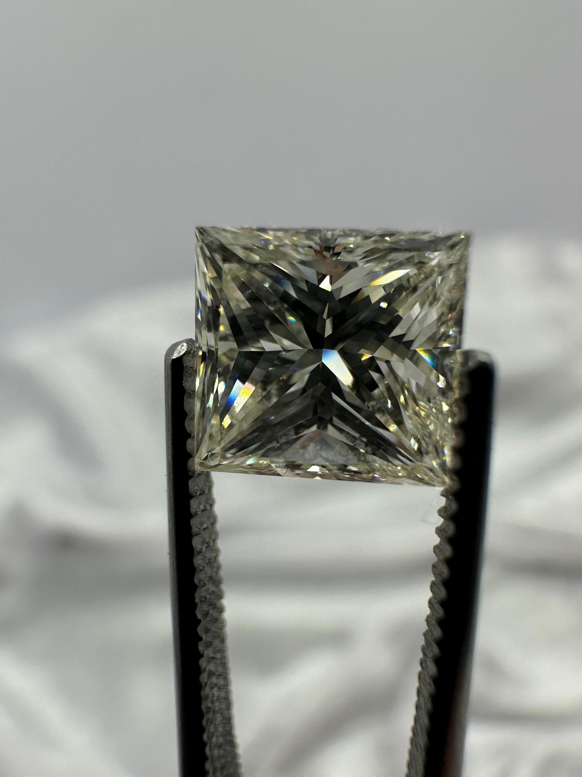 IGI certified princess cut 2.01 ct J/SI1. Good/VG Slight