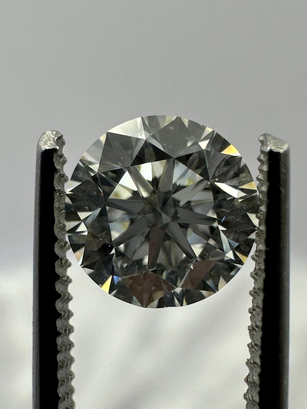 GIA certified round brilliant 1.20 ct J/VS1 EX/EX/EX Medium