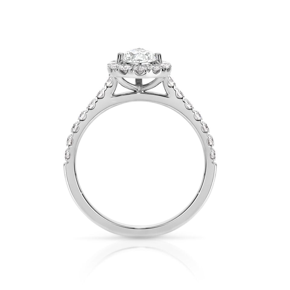GIA certified pear 0.70 ct F/SI2 set in 18K W/G halo ring. TCW 1.20+ cts