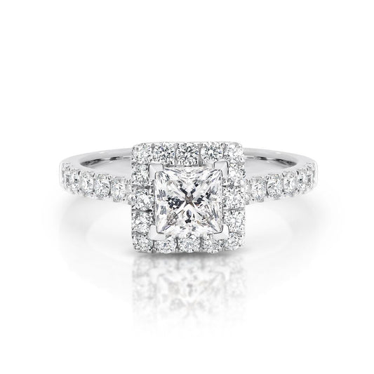 GIA certified princess 0.70 ct F/SI2 set in 18K W/G halo ring. TCW 1.20+ cts
