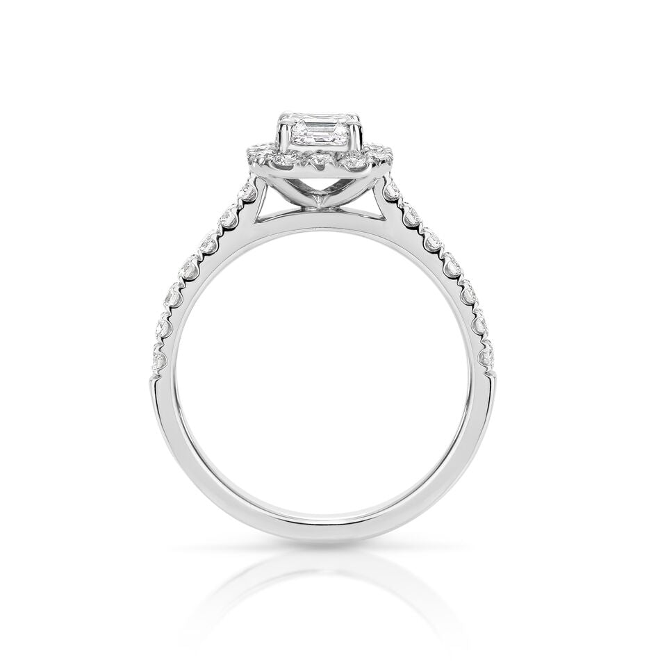 GIA certified asscher 0.70 ct F/VS2 set in 18K W/G halo ring. TCW 1.20+ cts