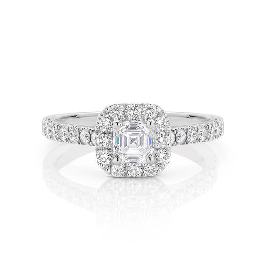 GIA certified asscher 0.70 ct F/VS2 set in 18K W/G halo ring. TCW 1.20+ cts