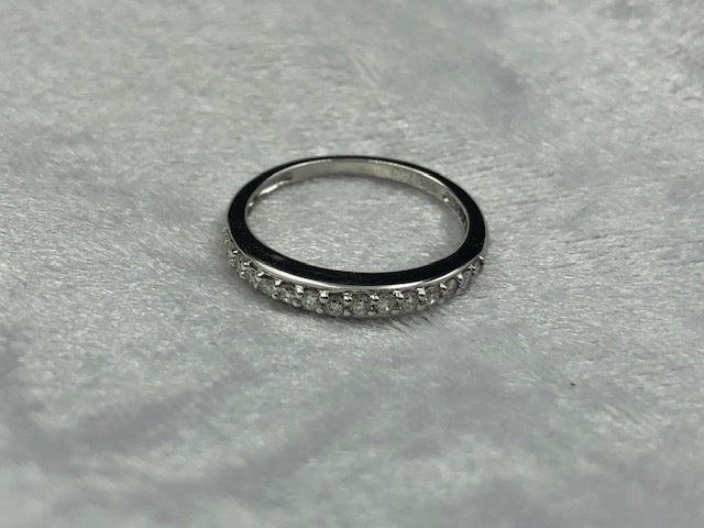 Grain set diamond wedding band.