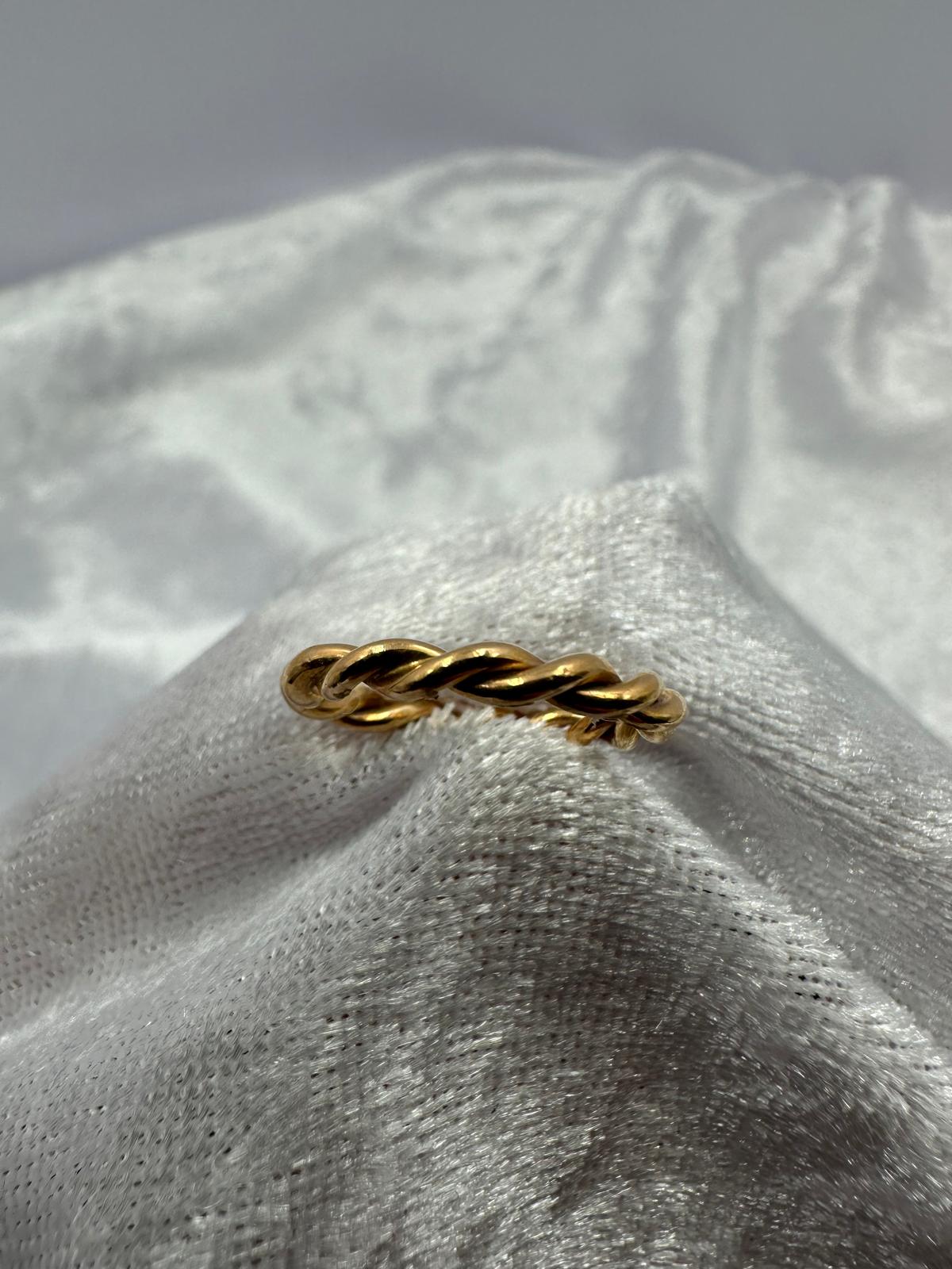 18K Rose Gold Twist eternity ring.