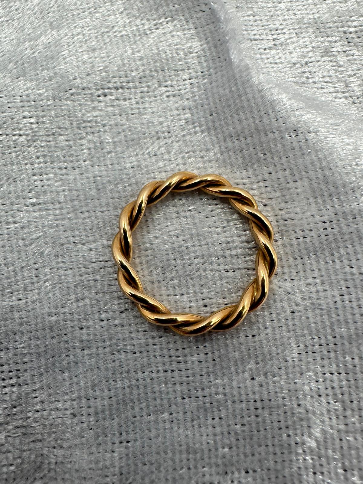 18K Rose Gold Twist eternity ring.