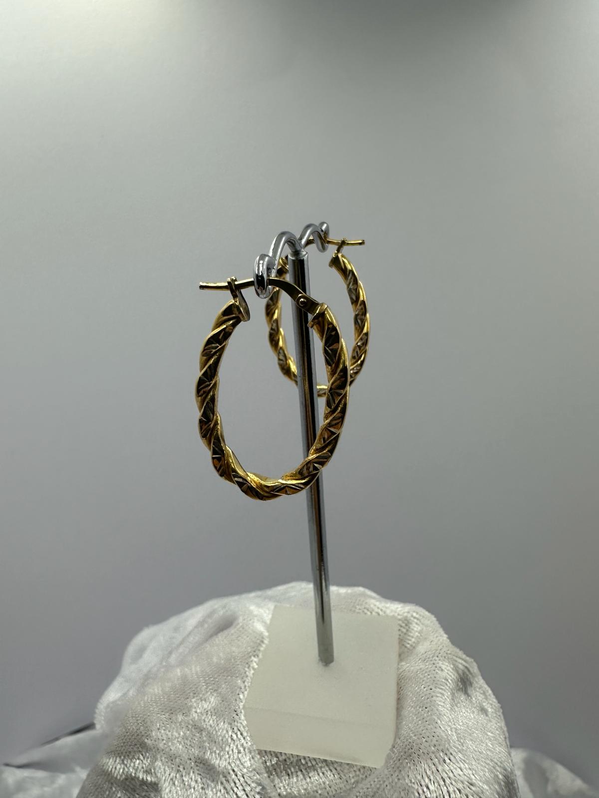9K gold hoop earrings.
