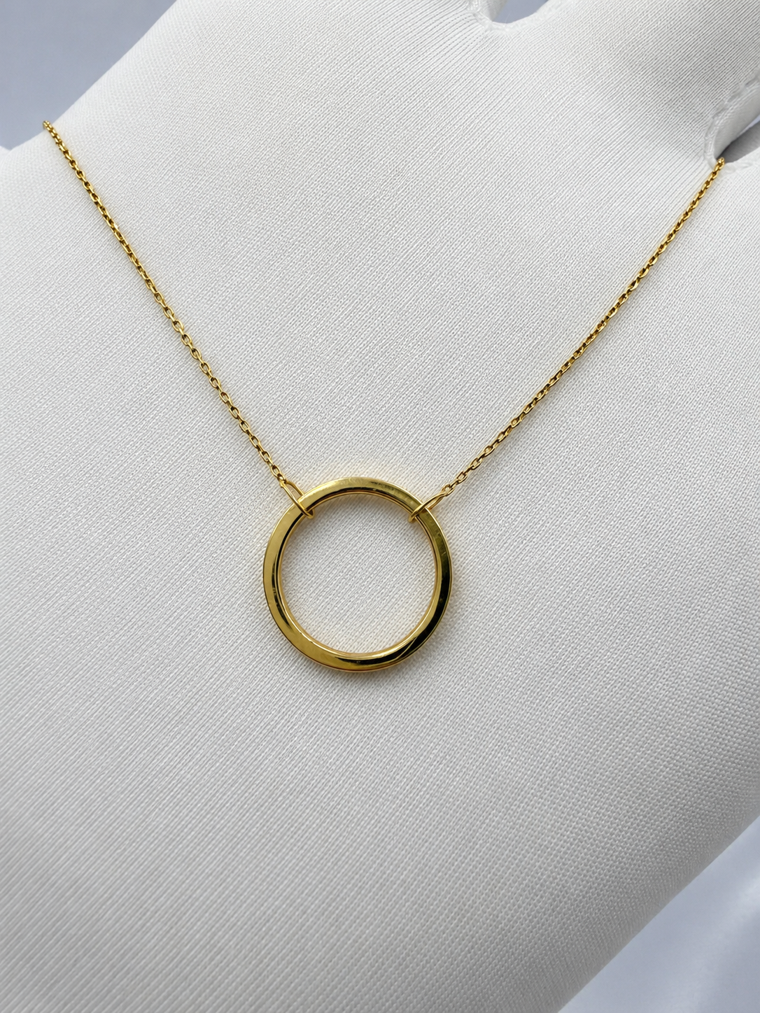 10K yellow gold loop pendant on cable chain. 46cm long