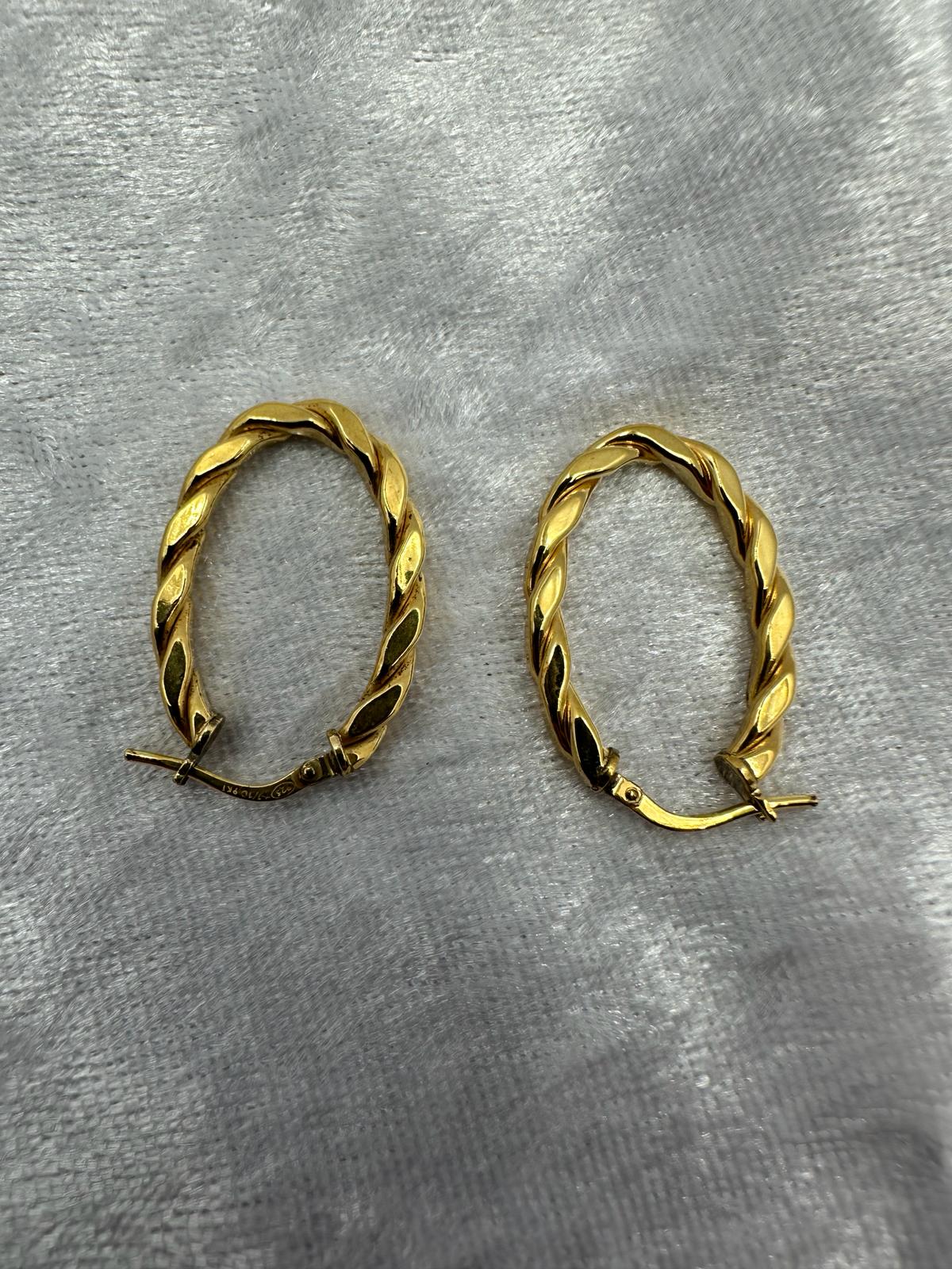 9K gold hoop earrings, top-down view