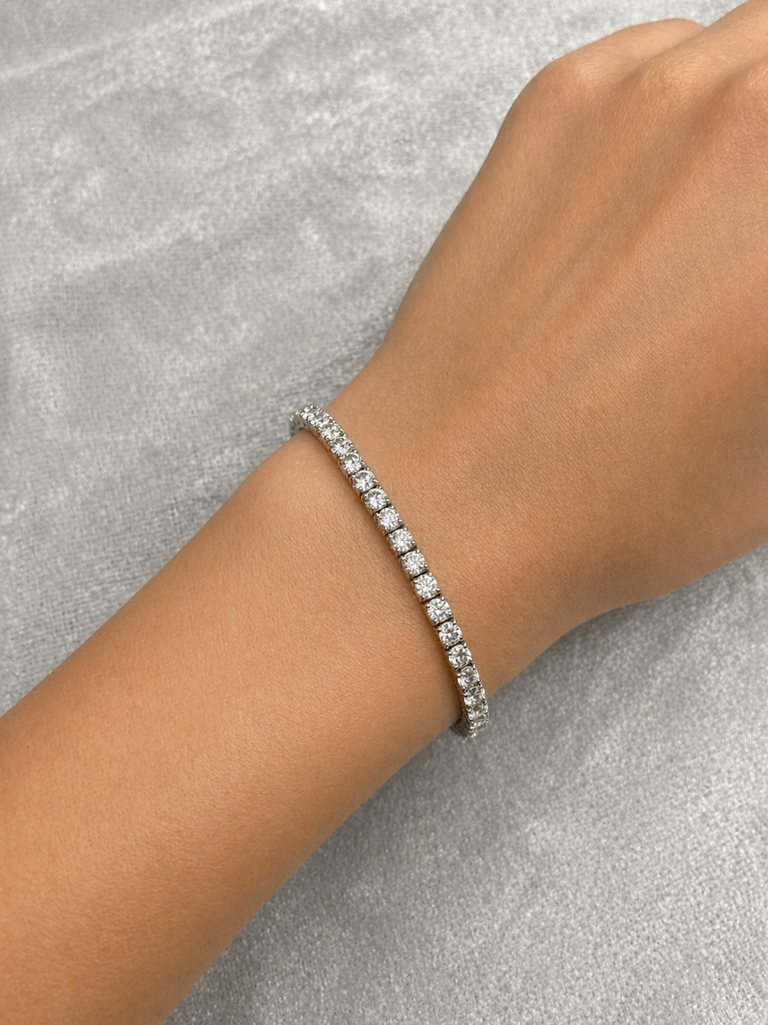 18K white gold box tennis bracelet. 6.44 Total carat weight