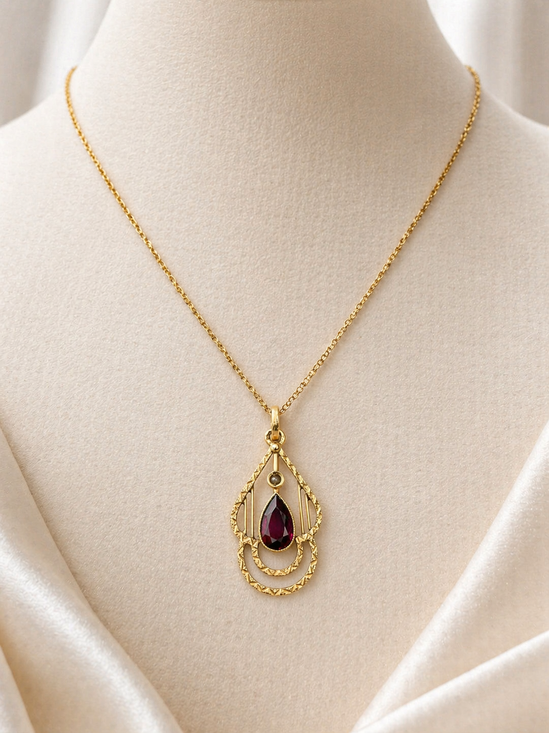 14K yellow gold art deco pendant with pear garnet