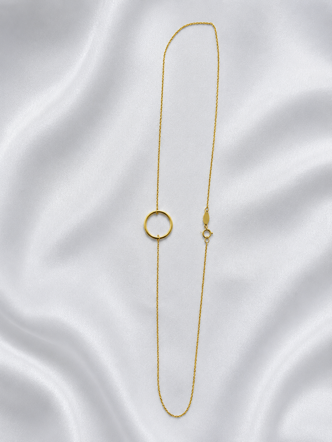 10K yellow gold loop pendant on cable chain. 46cm long
