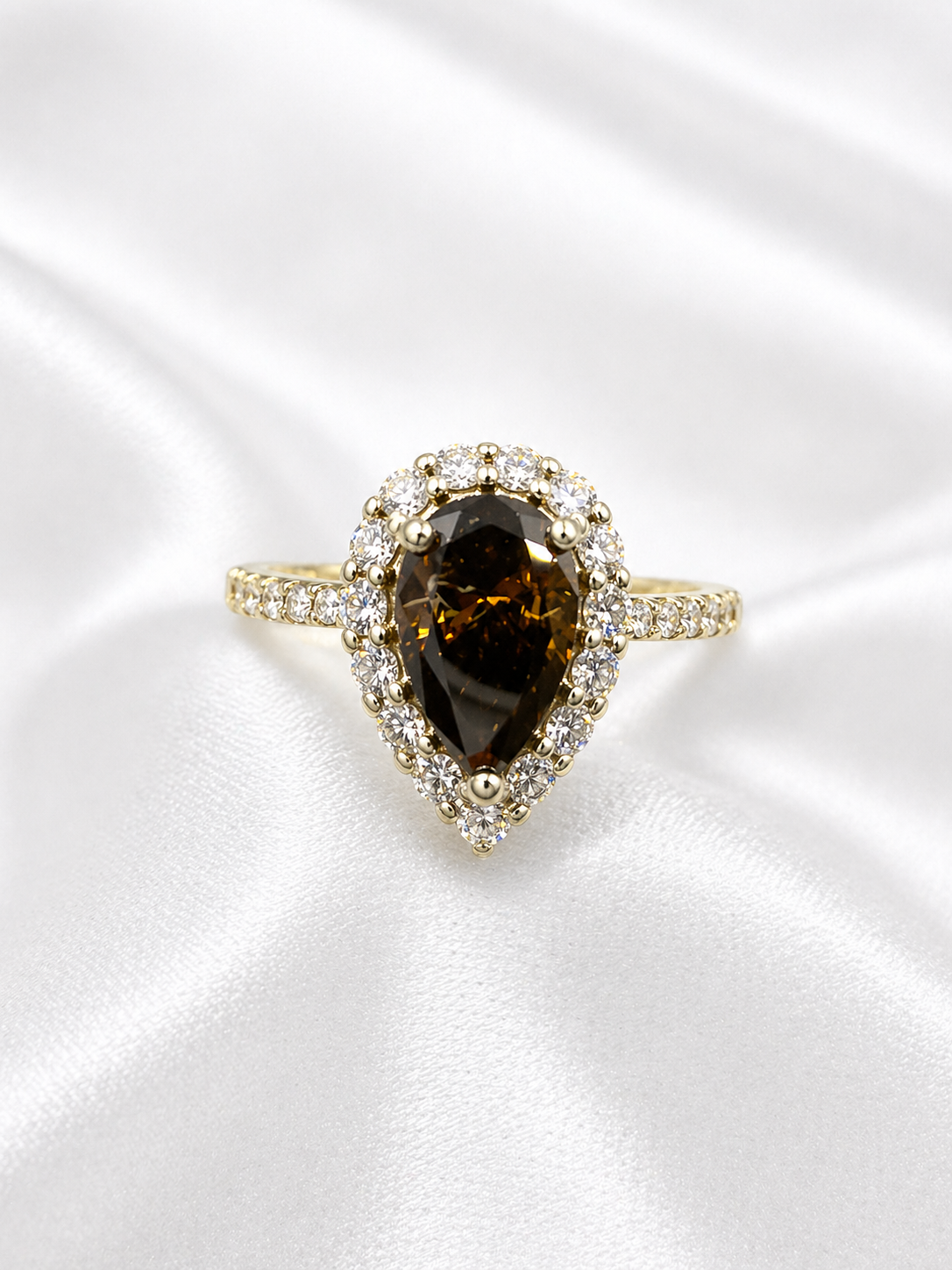 18K yellow and white gold halo ring with Fancy Dark Brown pear brilliant lab grown diamond