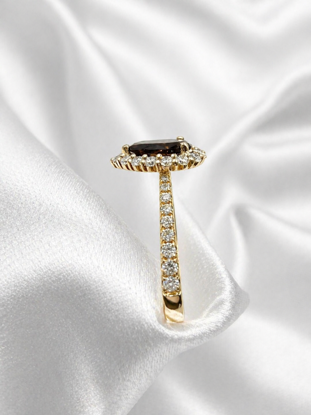 18K yellow and white gold halo ring with Fancy Dark Brown pear brilliant lab grown diamond