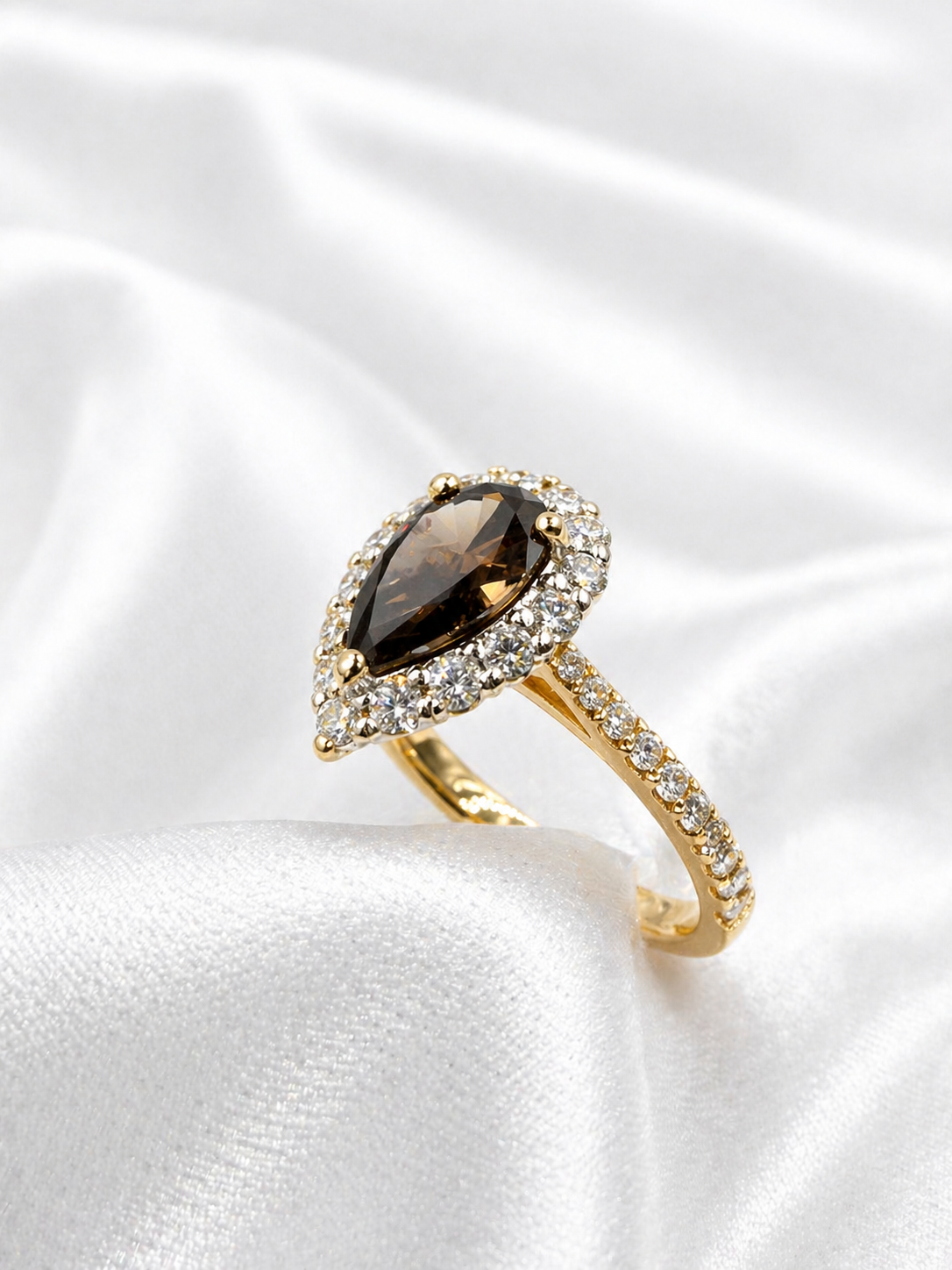 18K yellow and white gold halo ring with Fancy Dark Brown pear brilliant lab grown diamond