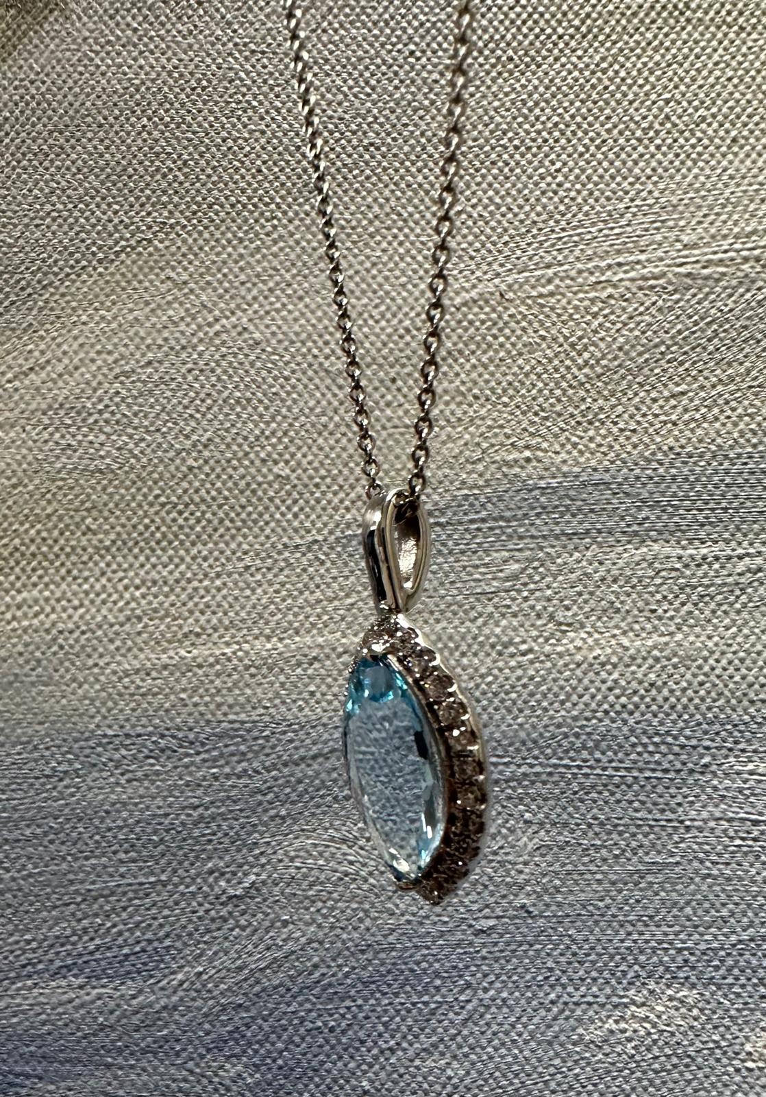 Light Blue marquise topaz and diamond pendant