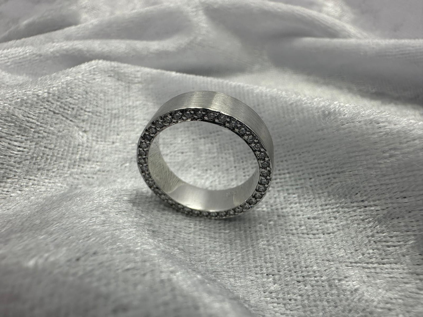 Diamond grain set eternity ring
