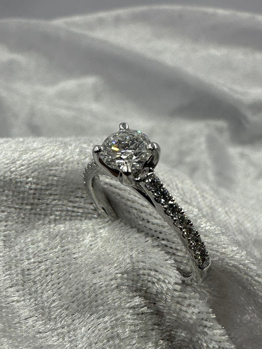 GIA certified 0.70 ct D/SI2 XXX NIL, 18K w/G pave set ring