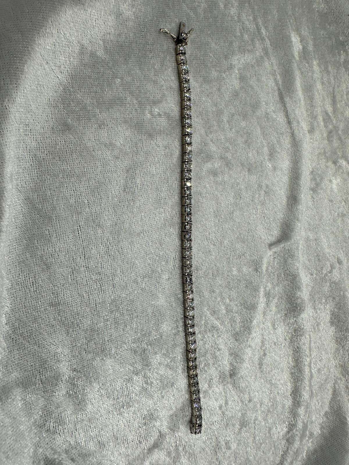 18K white gold box tennis bracelet. 6.44 Total carat weight