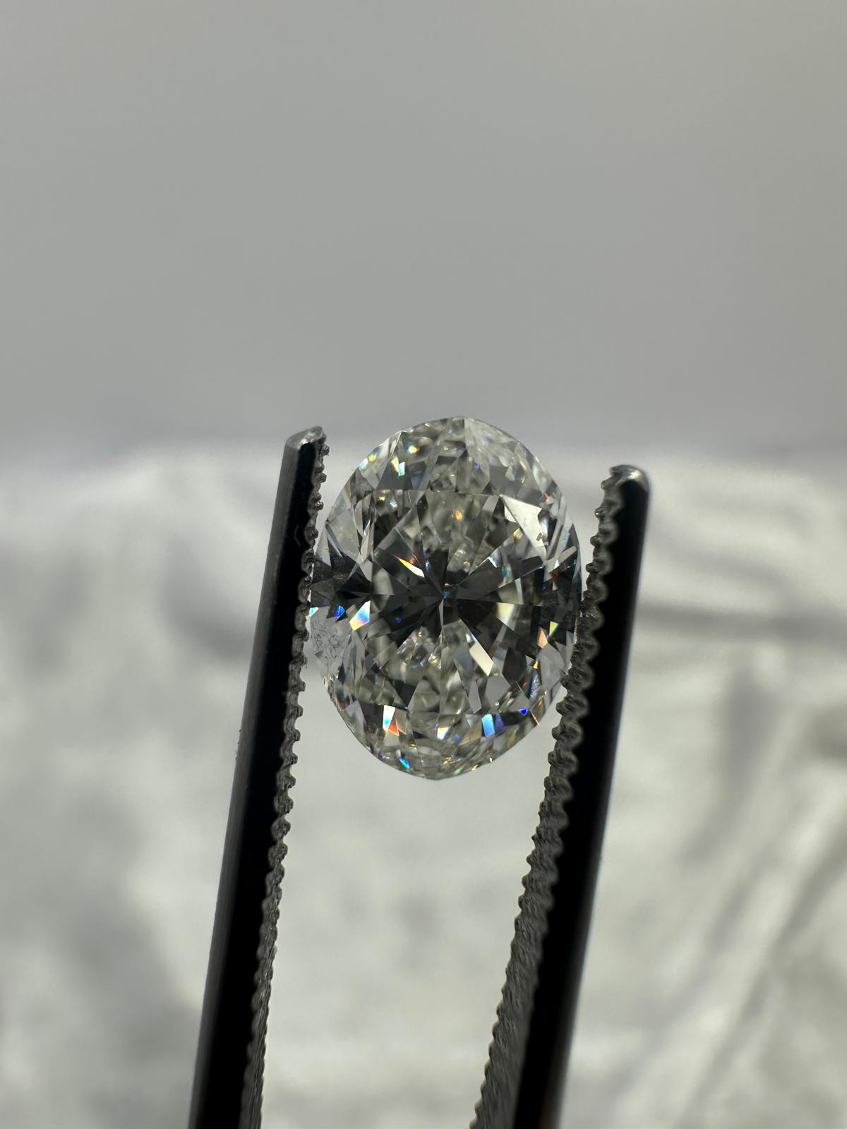 GIA certified oval brilliant 1.50 ct G/Si1 EX/VG NIL