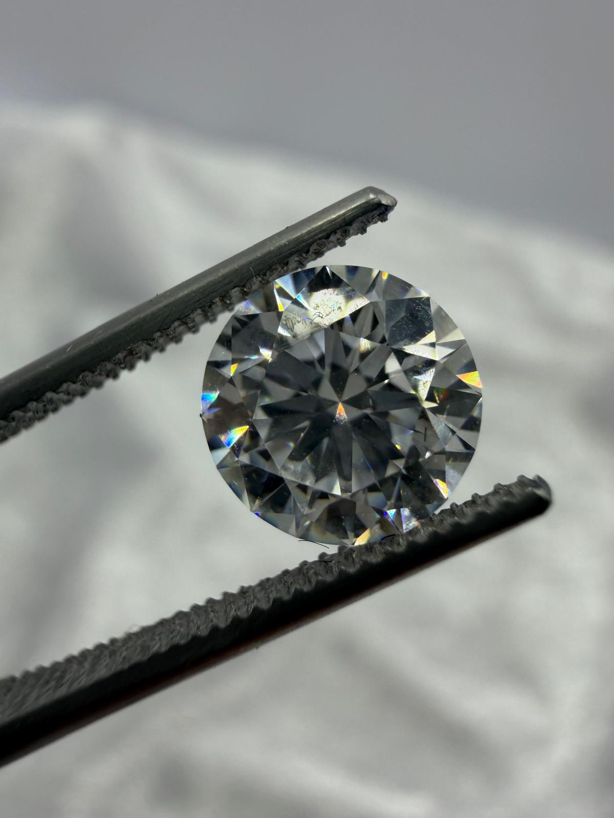 DeBeers Forever Mark natural diamond. Round 1.71 ct F/VS2 XXX Med