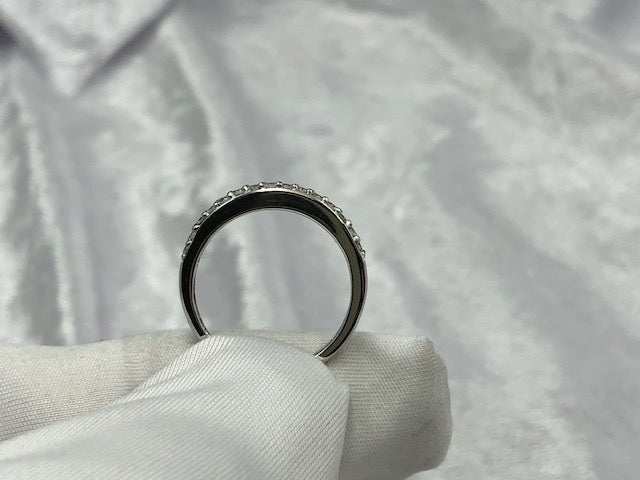 Grain set diamond wedding band, side view