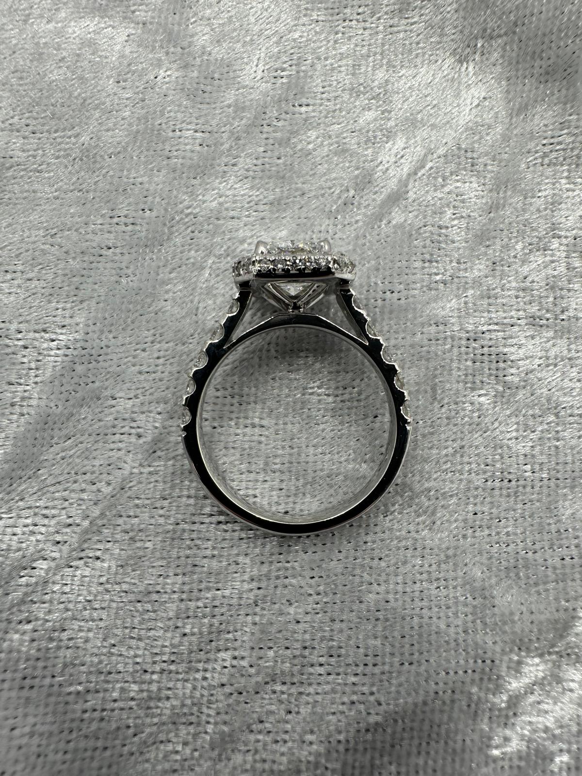Stunning radiant cut lab grown and natural diamond halo ring. 2.99 TCW, main product view