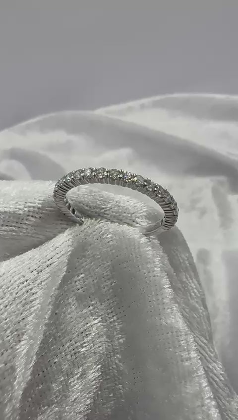 classic shared claw diamond ring in 18K whte gold. 0.66 TCW