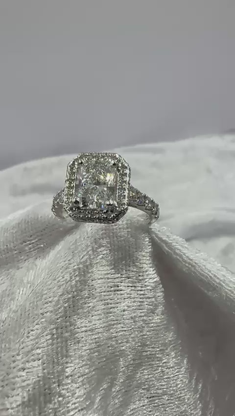 Stunning radiant cut lab grown and natural diamond halo ring. 2.99 TCW