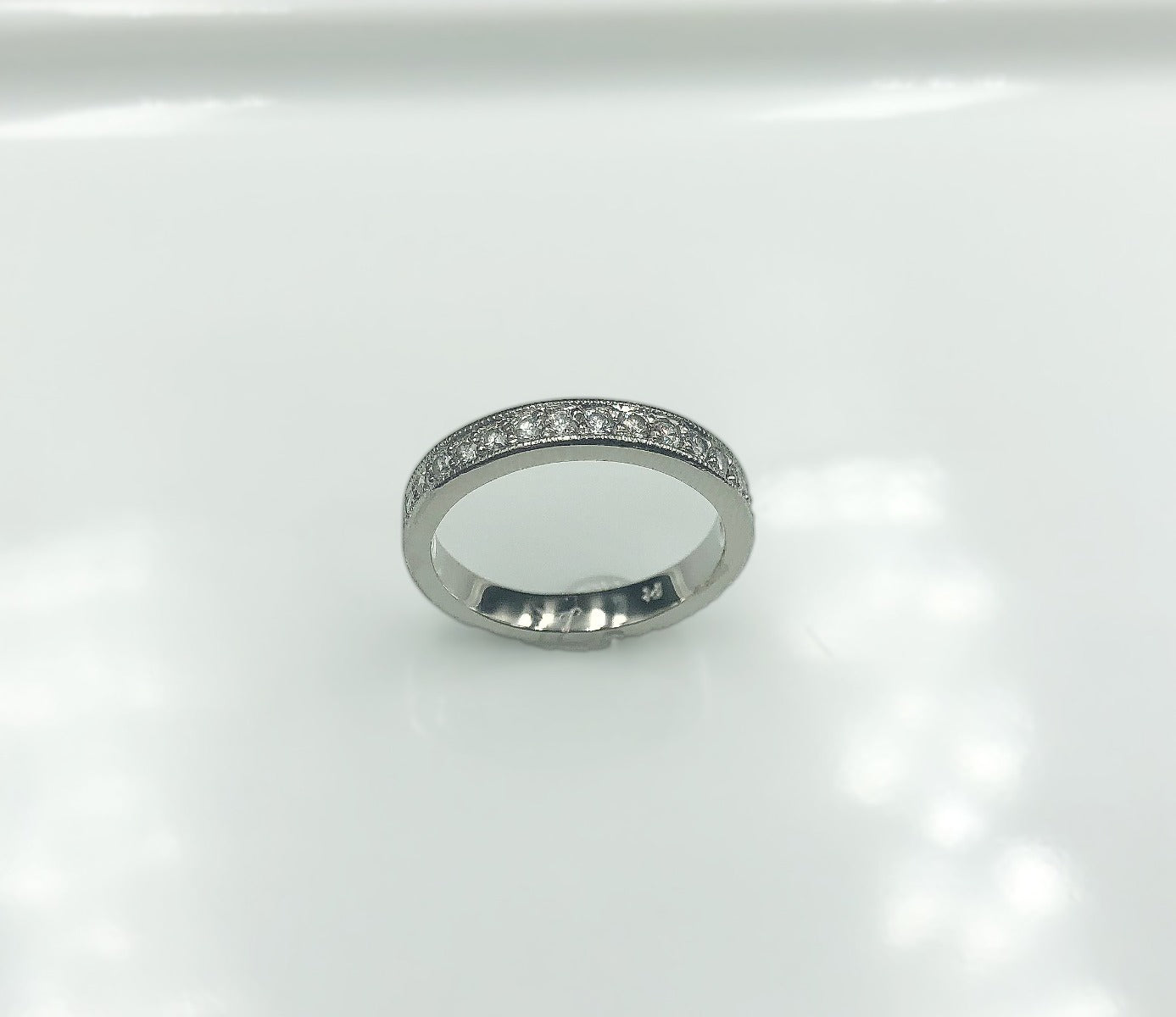 Platinum grain set diamond ring with Milgrain