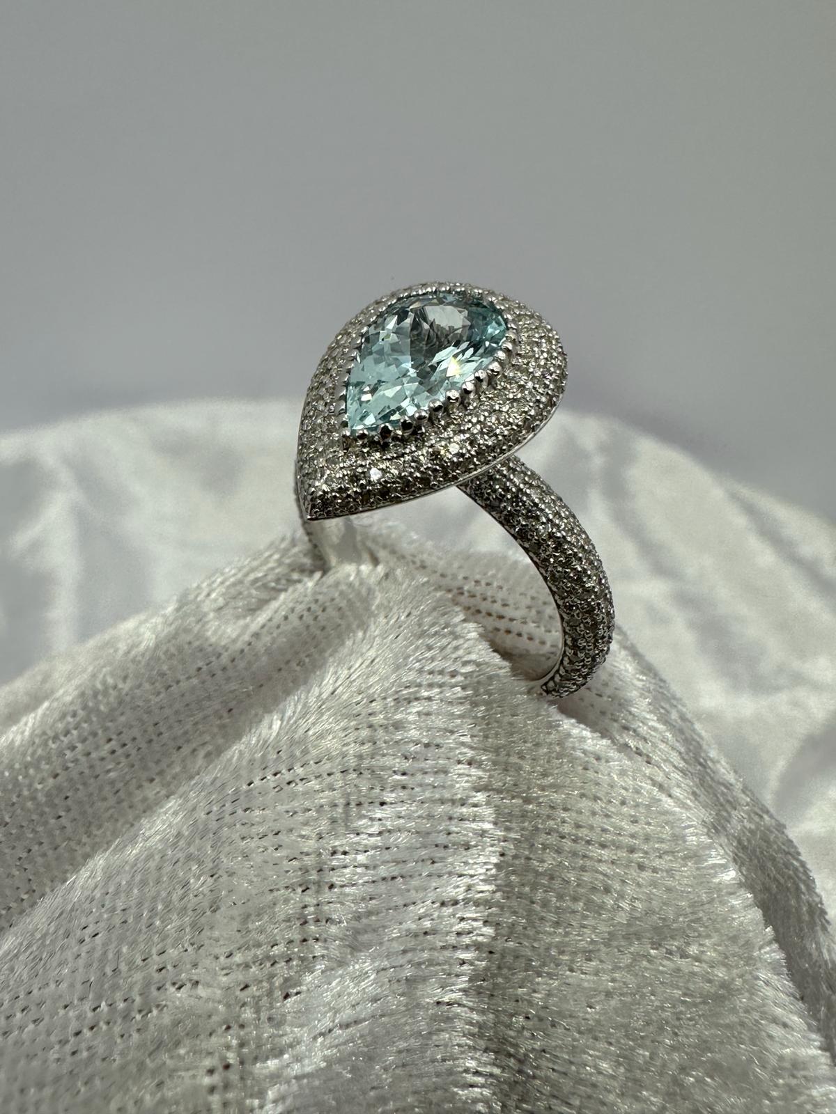 Stunning Aquamarine and diamond ring. 4.6+ total carats, angled view
