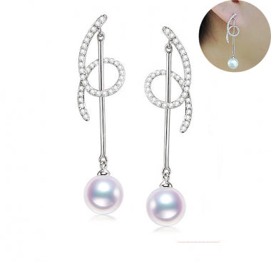 Dangle Freshwater Pearl earrings with diamonds